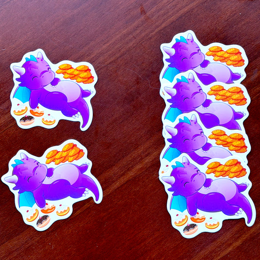 Sticker: Sleepy dragon with latkes and sufganiyot