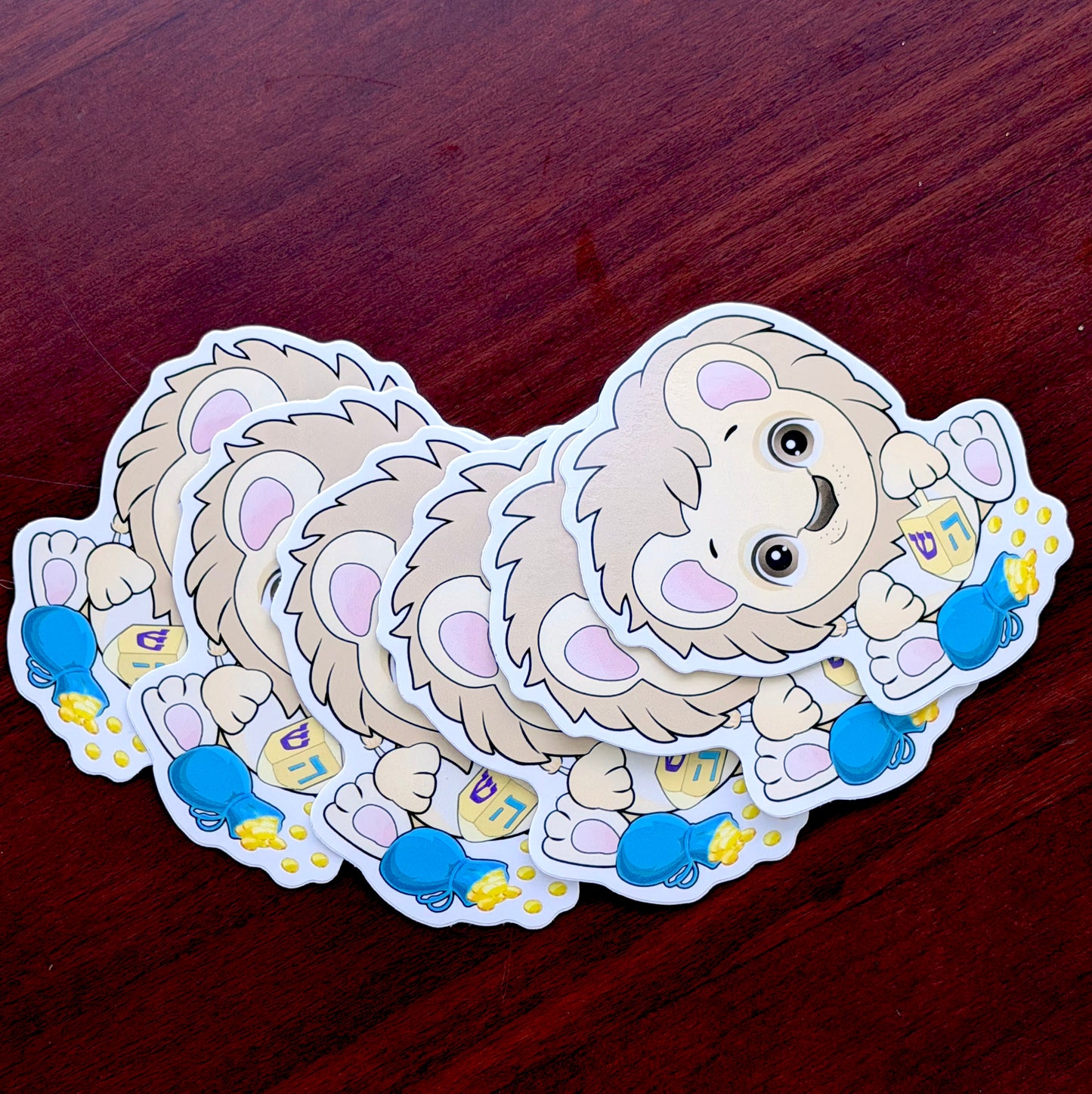 Sticker: Lion with dreidel and gelt