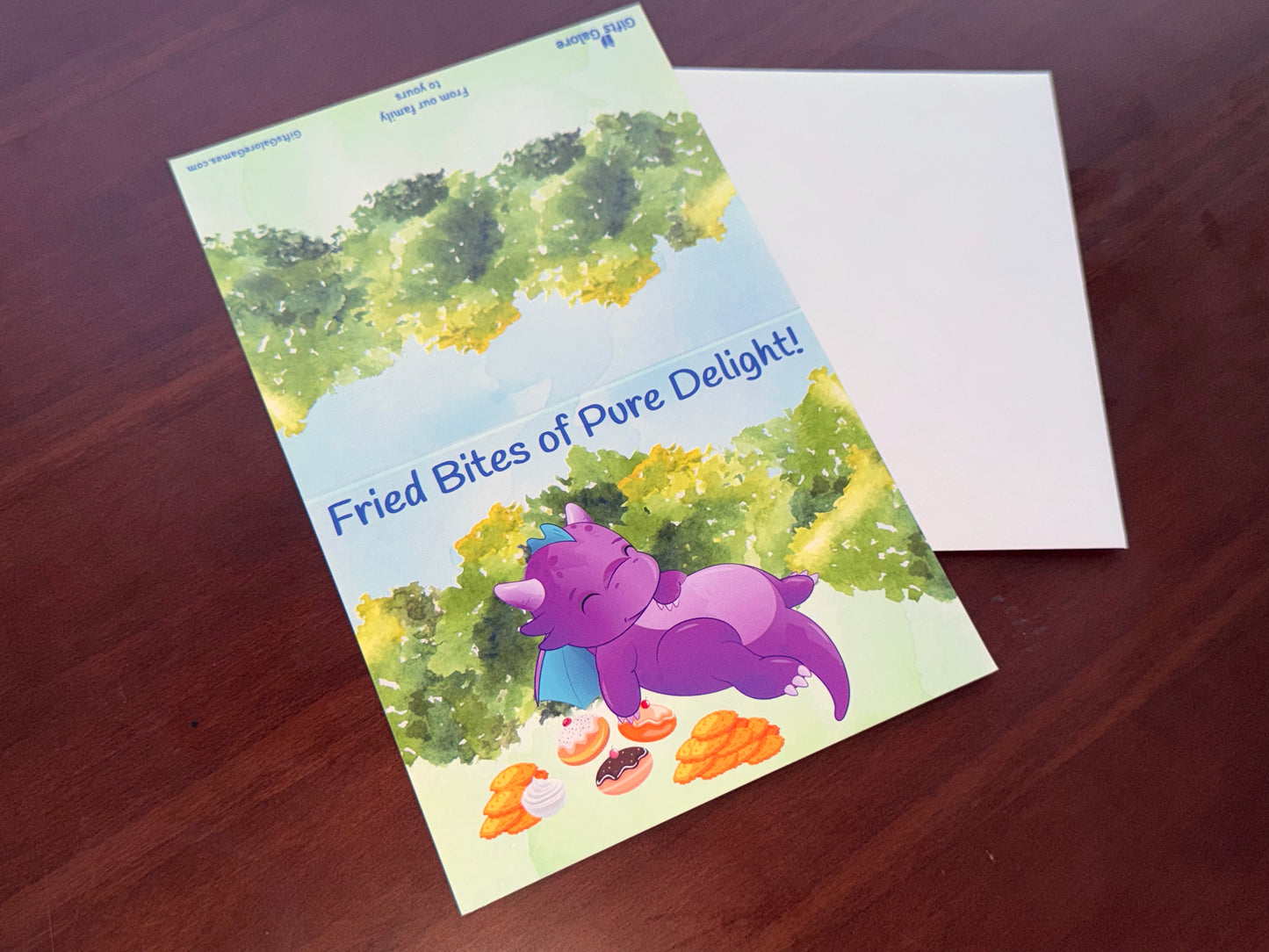 Greeting card: Sleepy dragon with latkes and sufganiyot